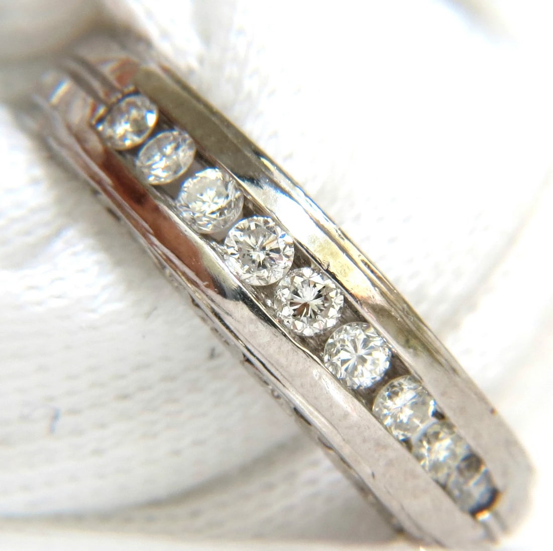 .75ct. DIAMONDS CHANNEL DECO GILT ETCHED SCALING SHANK RING+: Title: .75ct. DIAMONDS CHANNEL DECO GILT ETCHED SCALING SHANK RING+ Description: Vintage Platinum Deco .75ct diamonds G-color Vs-2 clarity Full Cuts and rounds Gorgeous etching detail on sites and