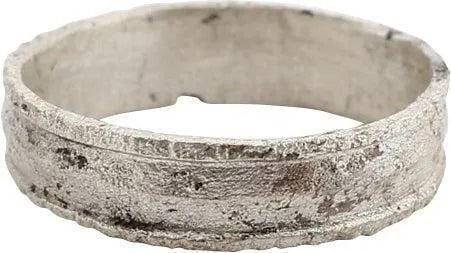 FINE ANCIENT VIKING WEDDING RING, SIZE 6: Wearable size 6, made for the small finger as was the custom. 10th-11th Century AD. Broadband, 4.5mm, with medial ridge and raised crenulated edges. Surface is well preserved with crisp decoration. Pr