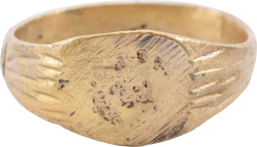 ROMAN FIGURAL RING, 1ST-3RD CENTURY AD, SIZE 10: Gilt bronze size 10 with 3.6mm band thickened at the bottom in the Roman taste and flaring to the reeded shoulders. The oval bezel incised with a figure, probably and animal, now obscured. Professiona