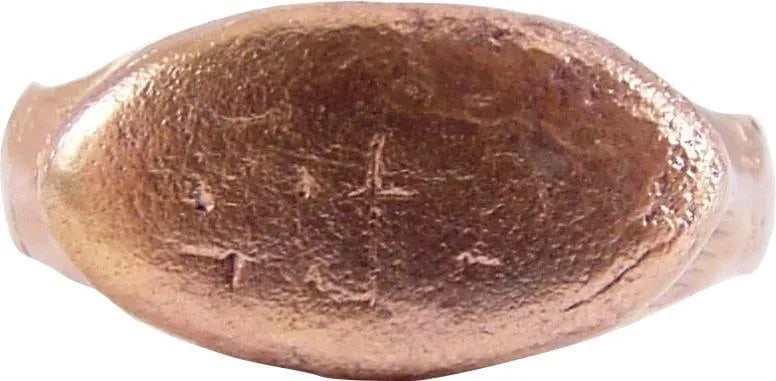VIKING WARRIOR'S RING 10TH-11TH CENTURY AD, SZ 8: Size 8 for the small finger. A pinky ring was popular for men and women alike. Broad rounded band, 4.5mm expanding to the reeded shoulders. Raised oval bezel with remnants of runic ciphers. Some wear