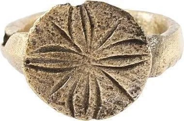 ROMAN WOMAN'S RING, SIZE SUB 1: Gilt bronze, very small, under 1 for the small finger. 2.5mm band with rounded face. Raised oval bezel, finely cut with a quatrefoil motif, probably meant as a signet. Crisp with the surface lightly