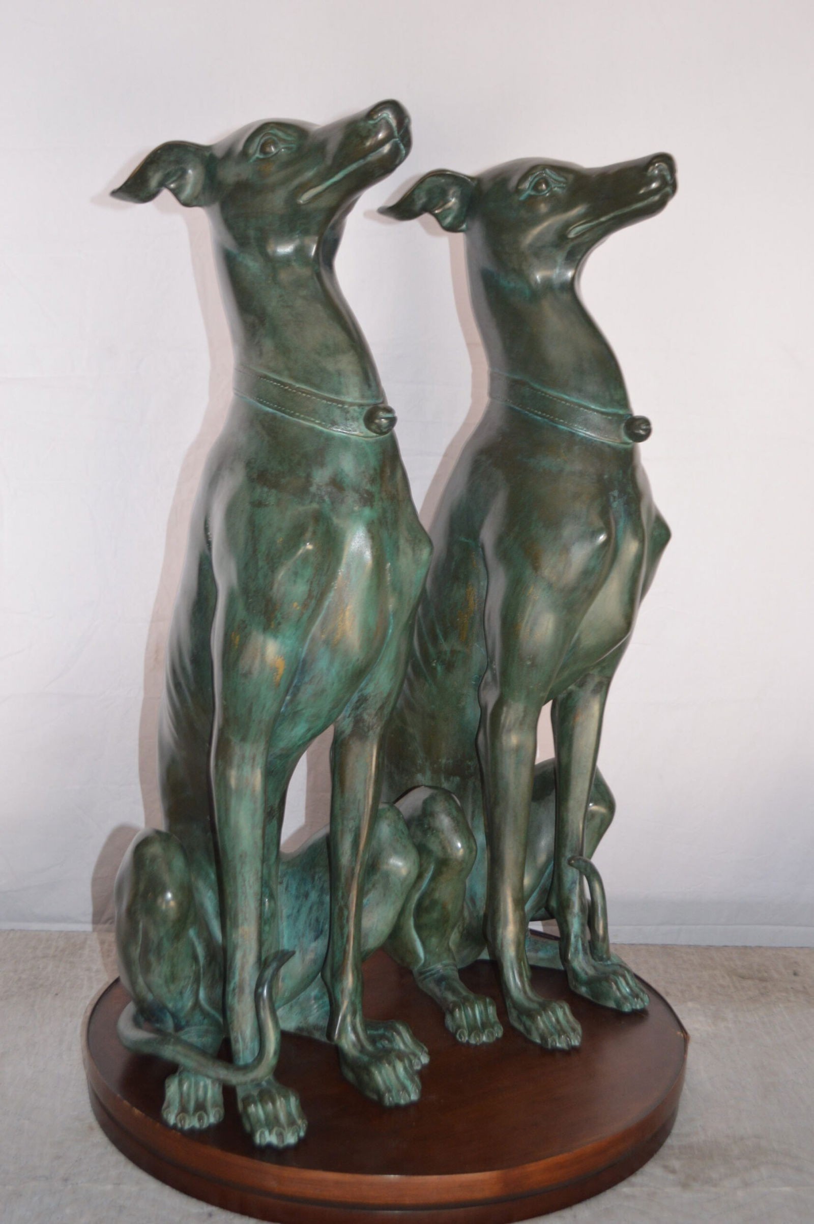 Pair of Greyhound dogs sitting Bronze Statue - Size: 12"L x 12"W x 35"H. - 5