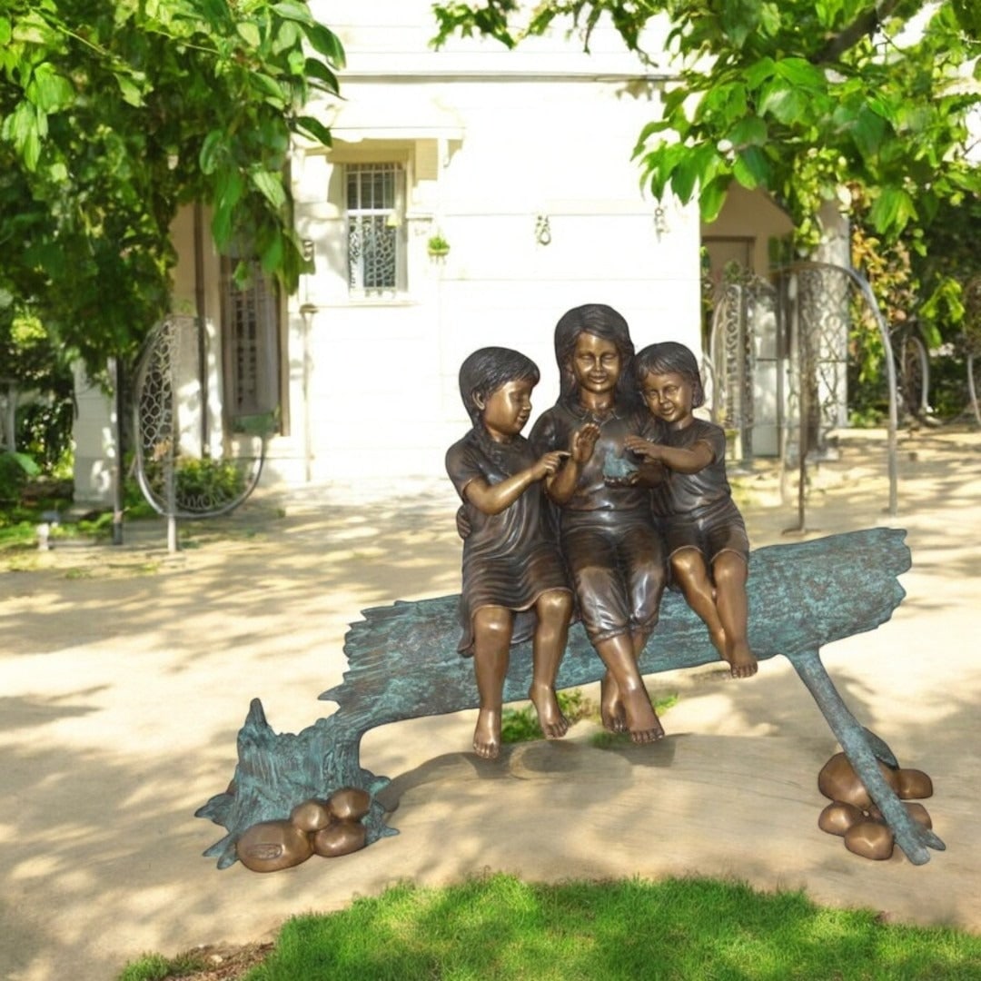 Three Children On Log Holding Bird Bronze Statue - Size: 55"L x 18"W x 38"H. - 3
