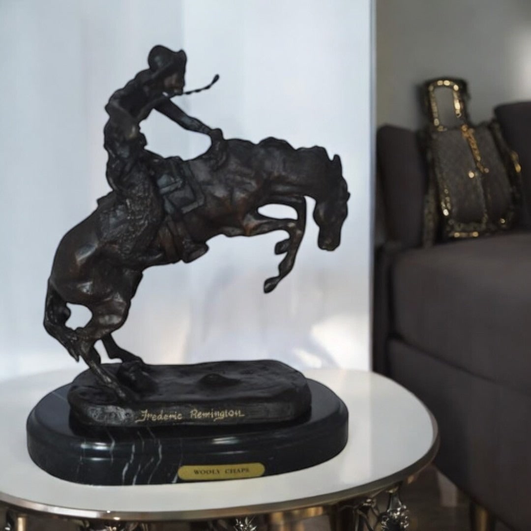 Wooly Chaps Bronze Statue by Remington 13H - Size: 8"L x 3"W x 9"H. - 3