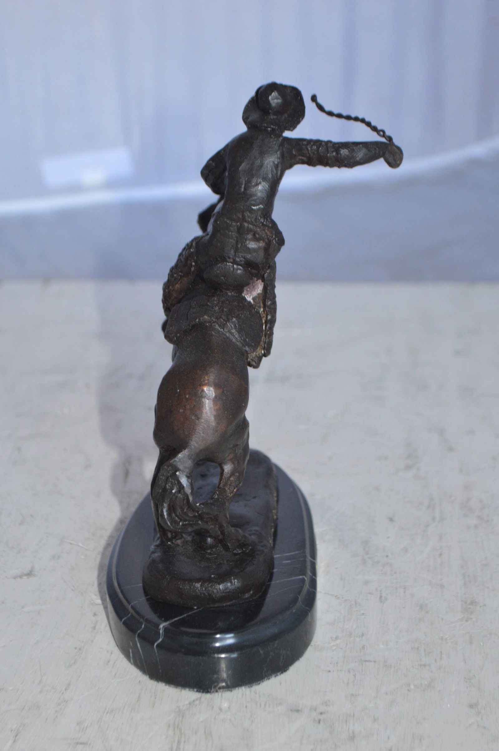 Wooly Chaps Bronze Statue by Remington 13H - Size: 8"L x 3"W x 9"H. - 7