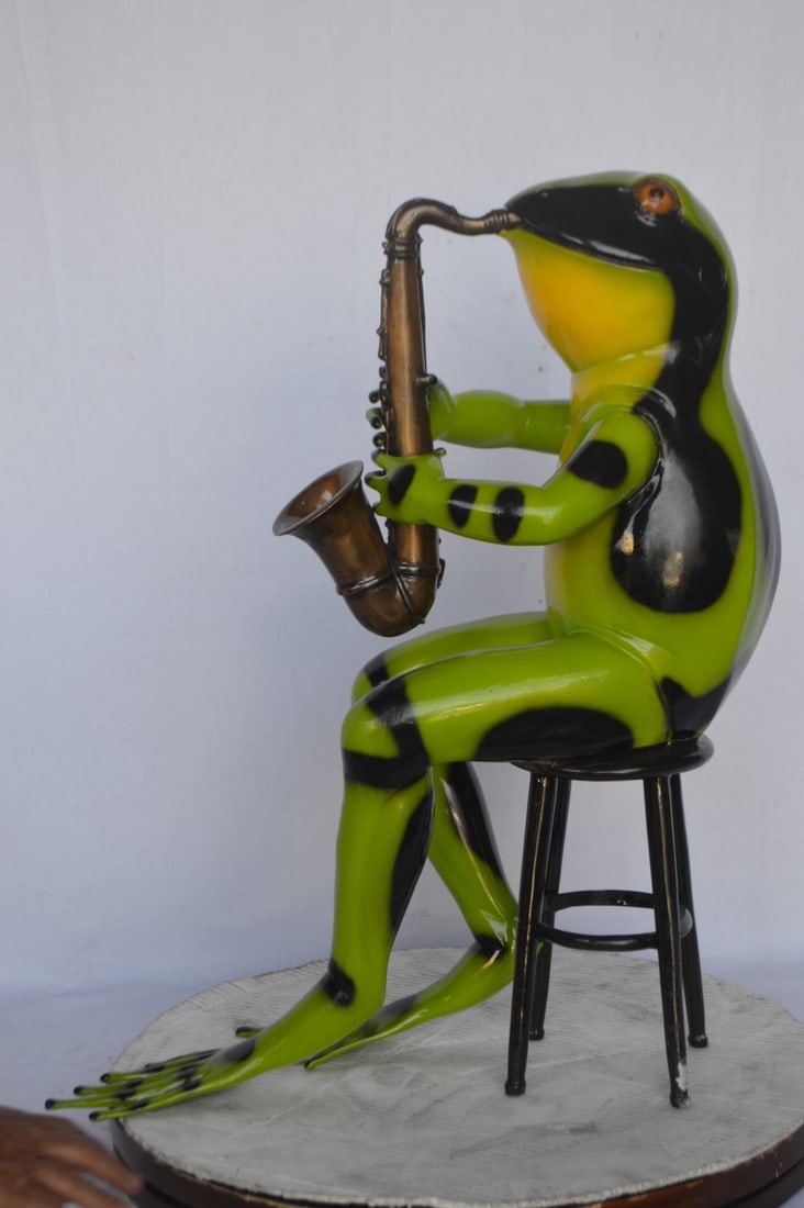 Green frog playing saxophone bronze statue - Size: 23"L x 15"W x 30"H. - 5
