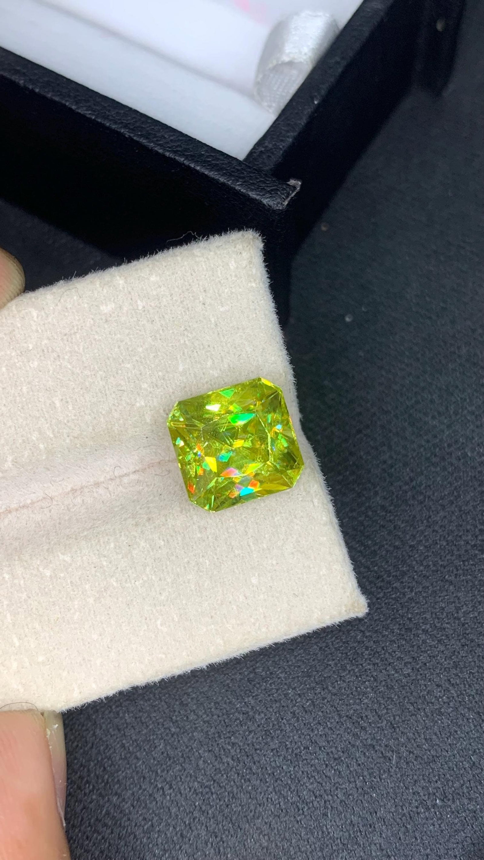 5.83 CT Sphene Gemstone: Emerald Cut Titanite, Rainbow Fire: Title: 5.83 CT Sphene Gemstone: Emerald Cut Titanite, Rainbow Fire Description: Materials: Gemstone: Sphene Carat weight: 5.83 ���������&