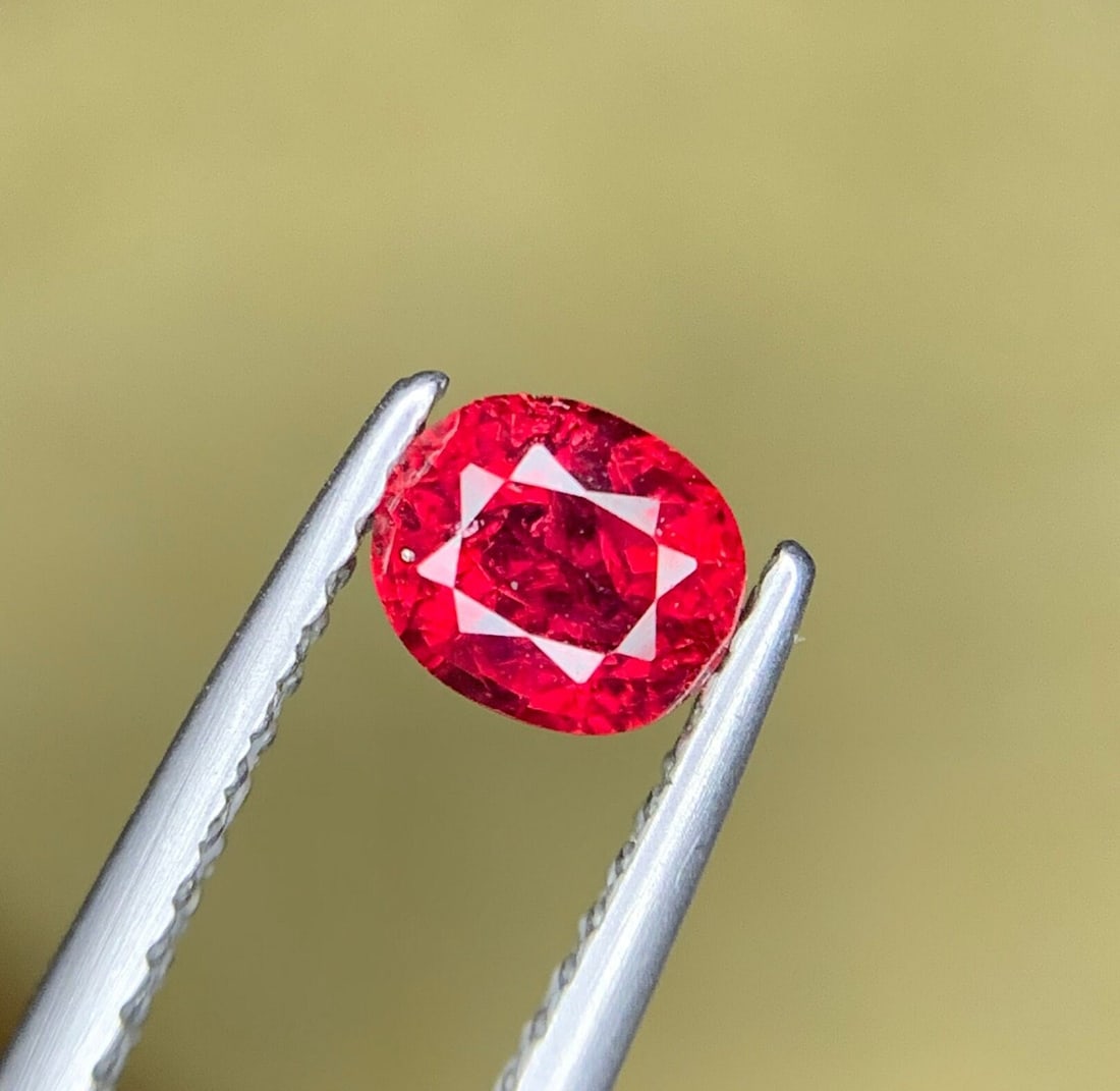 Pinkish Red Ruby: 0.5 Carat Oval Cut Mozambique Gemstone (1 of 6)