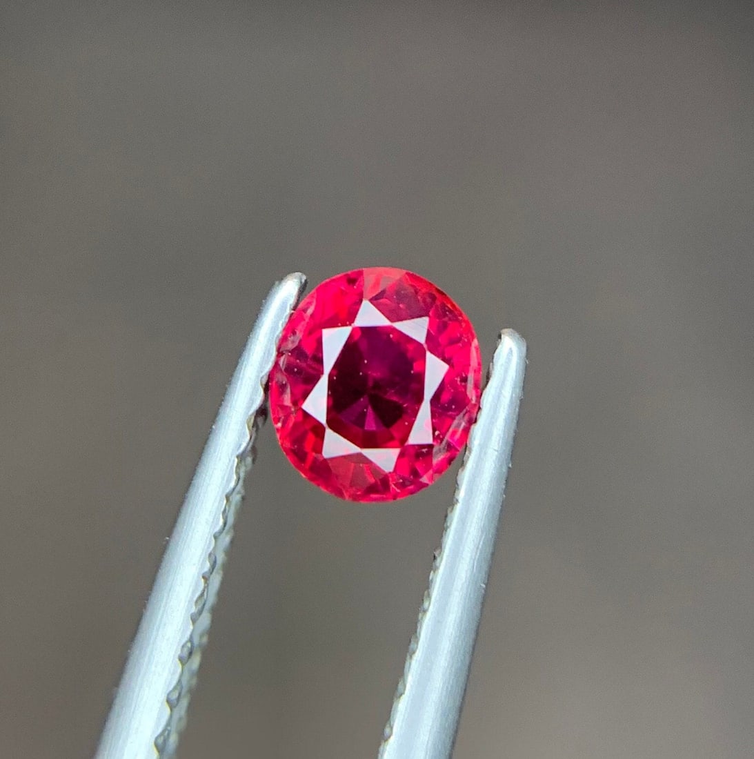 Reddish Ruby Loose Gemstone: 0.65 ct Oval Cut, Mozambique (1 of 8)