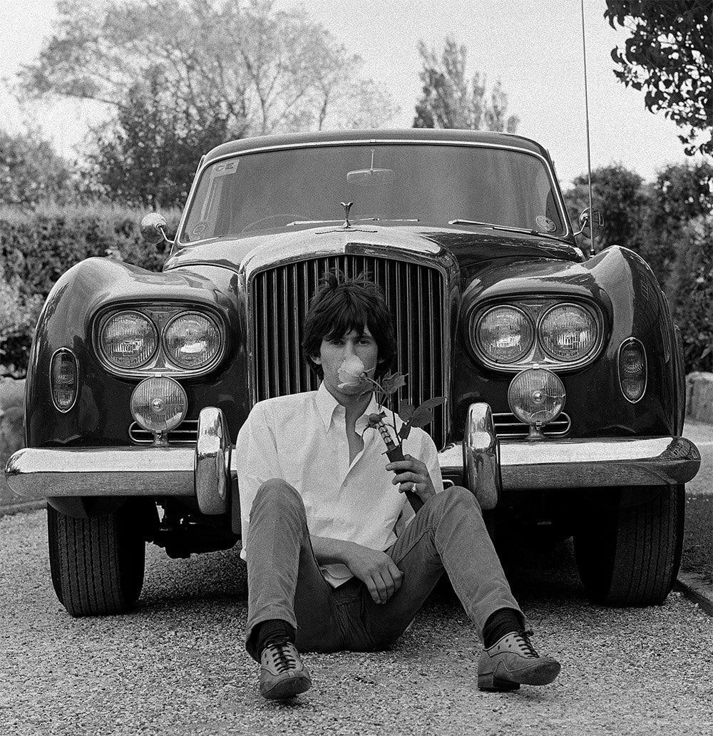Keith Richards sitting in front of Bentley, 1966 — Signed Limited Edition Print: 1966 (printed - 2