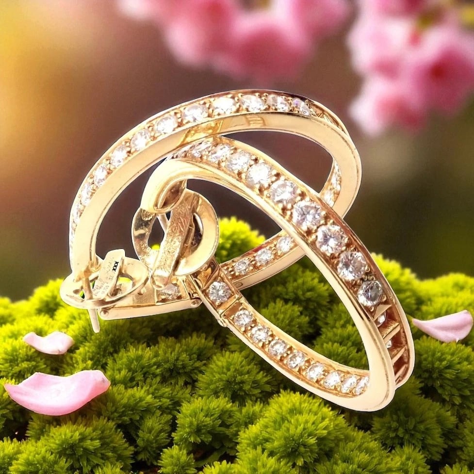Authentic! Van Cleef & Arpels 18k Yellow Gold Diamond Large Hoop Earrings: Authentic! Van Cleef & Arpels 18k Yellow Gold Diamond Large Hoop Earrings About This Piece: These Van Cleef & Arpels large hoop earrings are exquisitely crafted in 18k yellow gold and adorned with bri