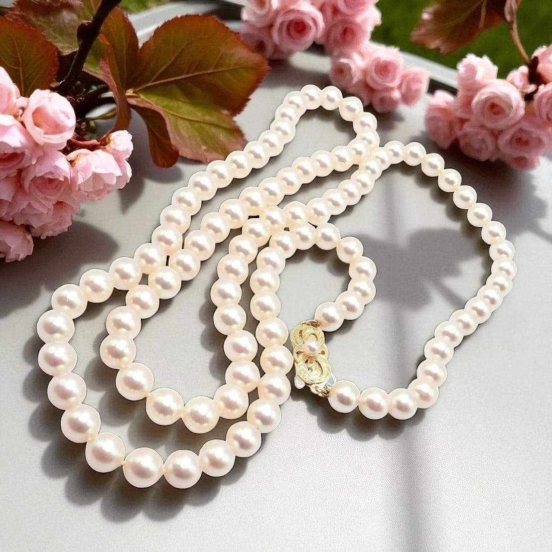 Rare! Mikimoto 18k Yellow Gold Pearl Strand 7mm 30" Opera Length Necklace: Rare! Mikimoto 18k Yellow Gold Pearl Strand 7mm 30" Opera Length Necklace About This Piece: Rare and elegant, this Mikimoto opera-length necklace showcases a 30-inch strand of glowing 7mm cultured pea