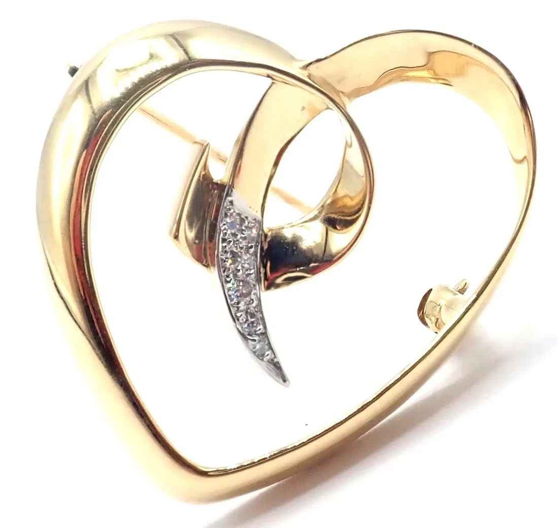 Authentic! Tiffany & Co Paloma Picasso 18k Yellow Gold Diamond Heart Pin Brooch: Authentic! Tiffany & Co Paloma Picasso 18k Yellow Gold Diamond Heart Pin Brooch About This Piece: Metal: 18k yellow gold Brooch Sizes: 29mm x 27mm Weight: 6 grams Stones: 7 Round Brilliant cut Diamond