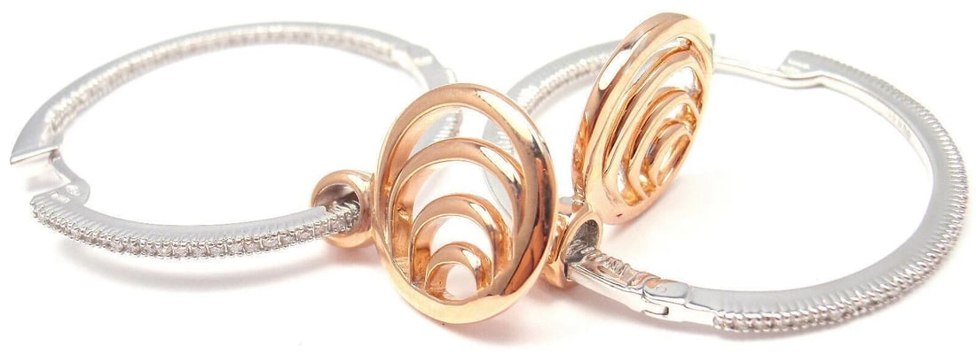 Authentic! Damiani 18k Rose/White Gold Diamond Hoop Earrings: Authentic! Damiani 18k Rose/White Gold Diamond Hoop Earrings About This Piece: These earrings come with Box, Certificate and Tag. Retail Price: $8,440.00 Metal: 18k Rose/White Gold Measurements: Lengt