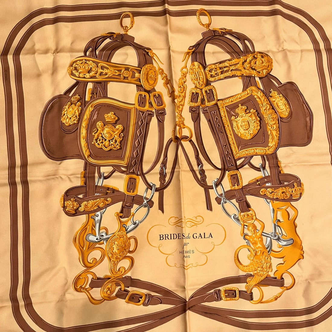 Authentic! Hermes Brides De Gala 90cm Orange Brown Silk Scarf: Authentic! Hermes Brides De Gala 90cm Orange Brown Silk Scarf About This Piece: Authentic Hermes "Brides De Gala" scarf, artfully woven from 90cm orange-brown silk, is an emblem of equestrian elegance
