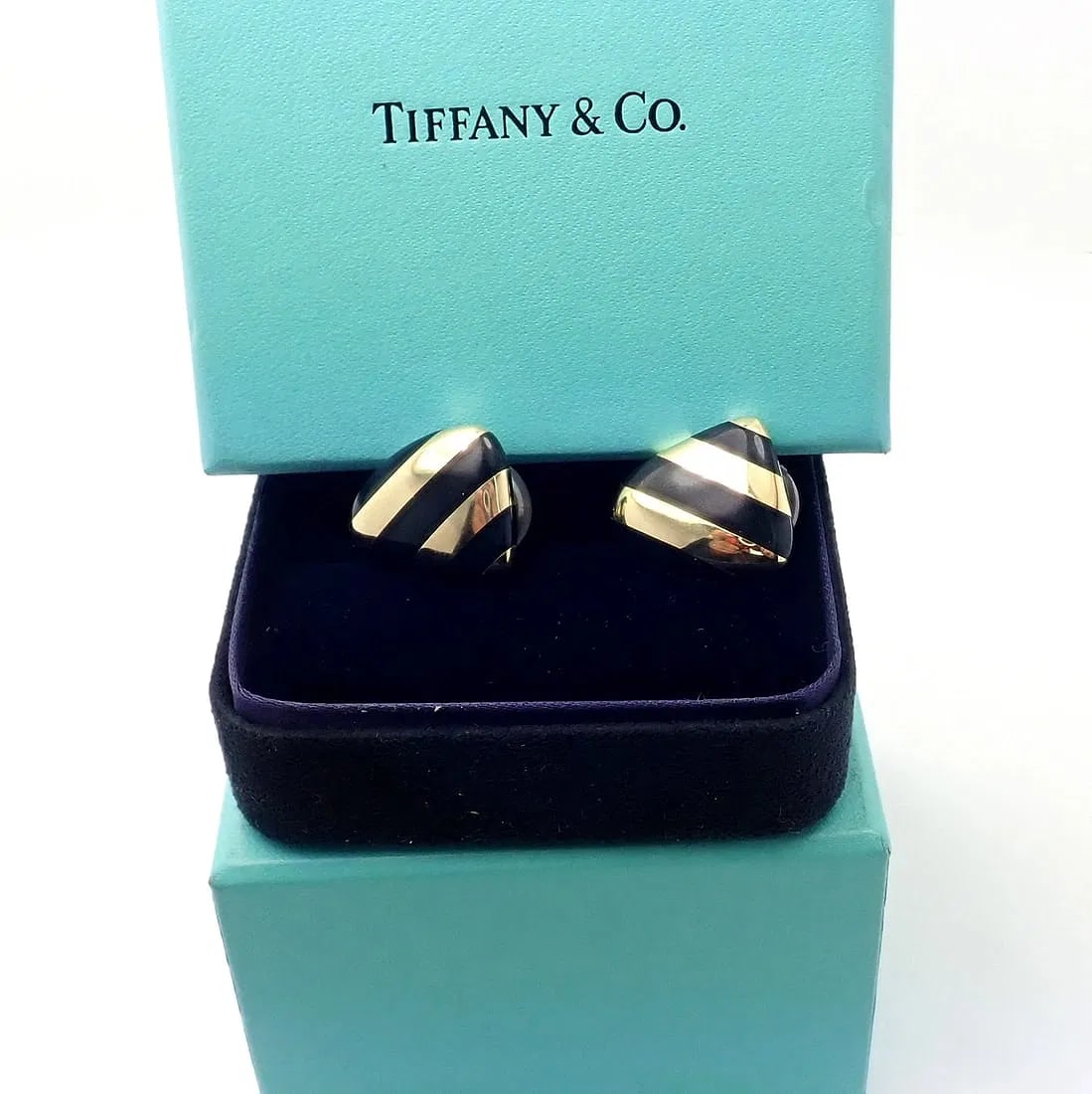 Tiffany & Co Angela Cummings 18k Yellow Gold Inlaid Black Jade Earrings: Tiffany & Co Angela Cummings 18k Yellow Gold Inlaid Black Jade Earrings About This Piece: These earrings are made for non pierced ears, but they can be converted by adding posts. Metal: 18k yellow gol