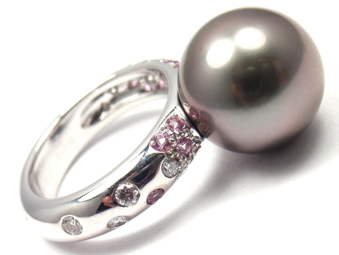 Authentic! Cartier 18k White Gold Tahitian Pearl Diamond Pink Sapphire Ring: Authentic! Cartier 18k White Gold Tahitian Pearl Diamond Pink Sapphire Ring About This Piece: About Cartier: The company has a long and distinguished history of serving royalty, as well as stars and c