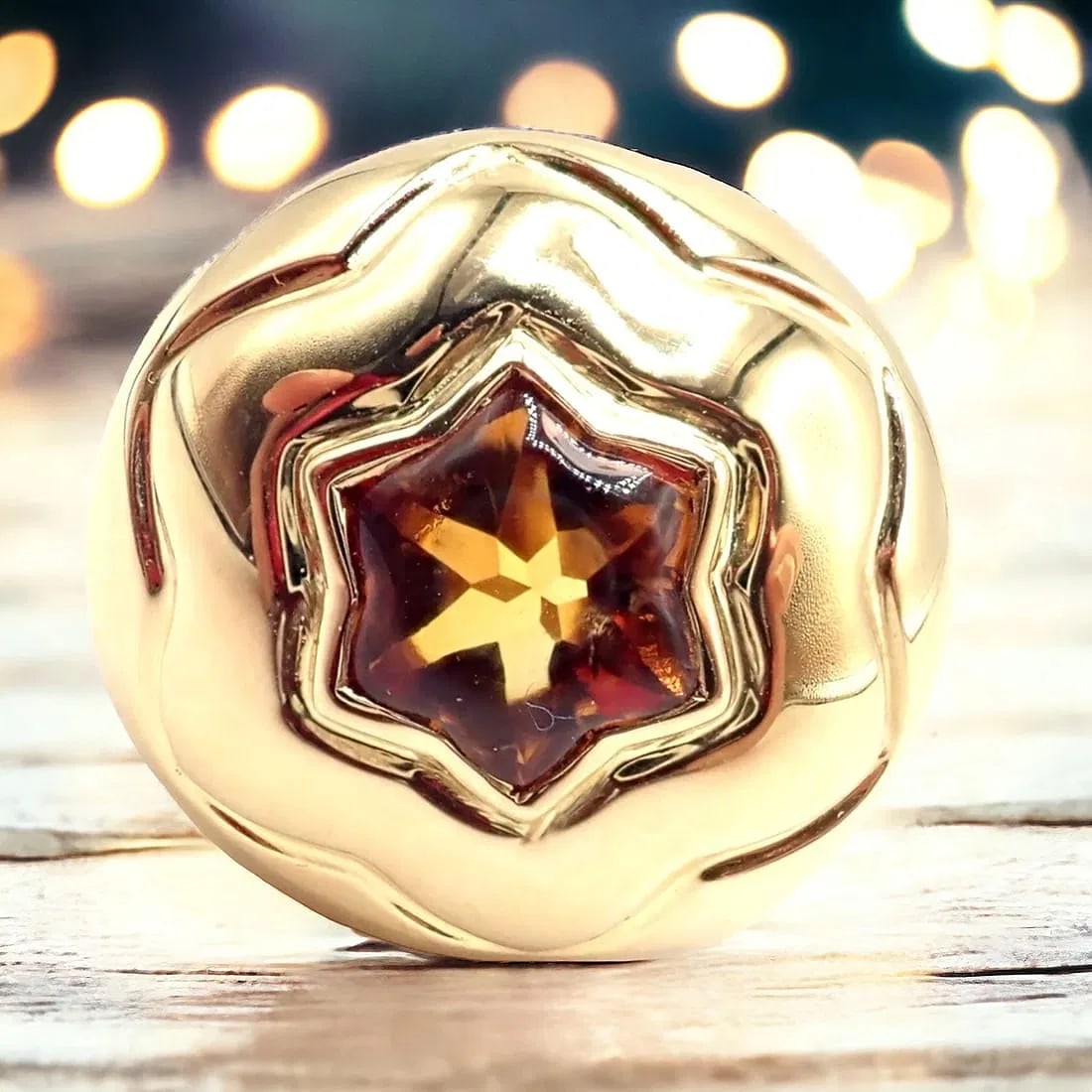 Authentic Bulgari Bvlgari 18k Yellow Gold Star Of David Shape Citrine Bombe Ring: Authentic Bulgari Bvlgari 18k Yellow Gold Star Of David Shape Citrine Bombe Ring About This Piece: The Bulgari Bvlgari 18k Yellow Gold Star of David Shape Citrine Bombe Ring is an exquisite piece of j