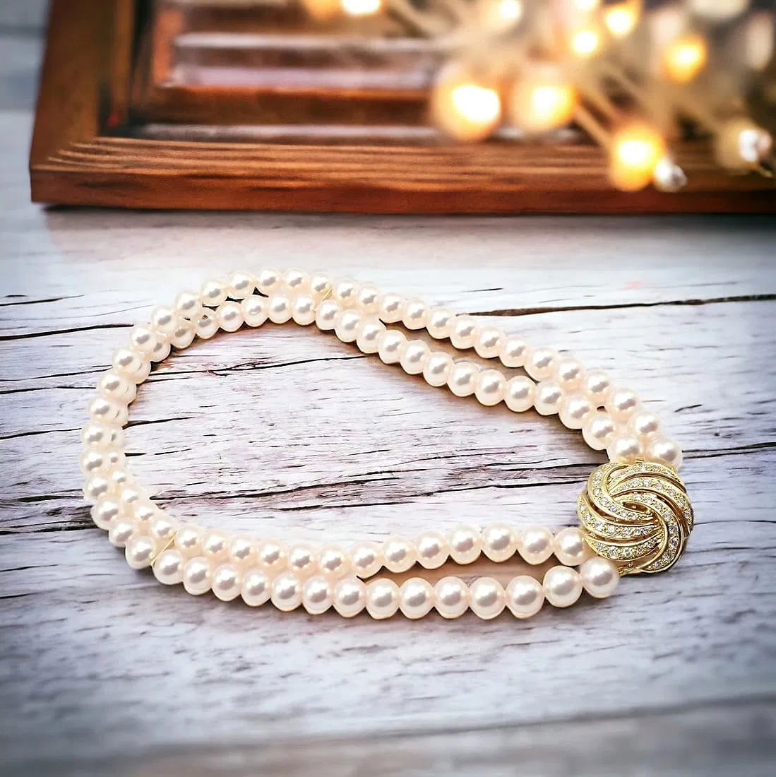 Authentic! Mikimoto 18k Yellow Gold Diamond Double Strand 8mm Pearl Necklace: Authentic! Mikimoto 18k Yellow Gold Diamond Double Strand 8mm Pearl Necklace About This Piece: The Authentic Mikimoto Double Strand Pearl Necklace is a paragon of elegance, crafted from 18k yellow gol