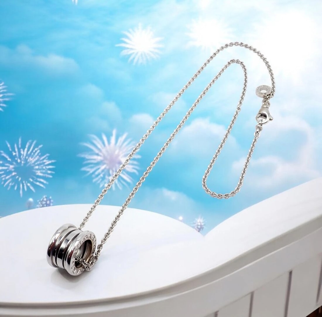 Authentic! Bulgari Bvlgari 18k White Gold B.Zero1 Pendant Necklace Box + Papers: Authentic! Bulgari Bvlgari 18k White Gold B.Zero1 Pendant Necklace Box + Papers About This Piece: This Bulgari B.Zero1 pendant necklace is crafted from luxurious 18k white gold, showcasing the iconic