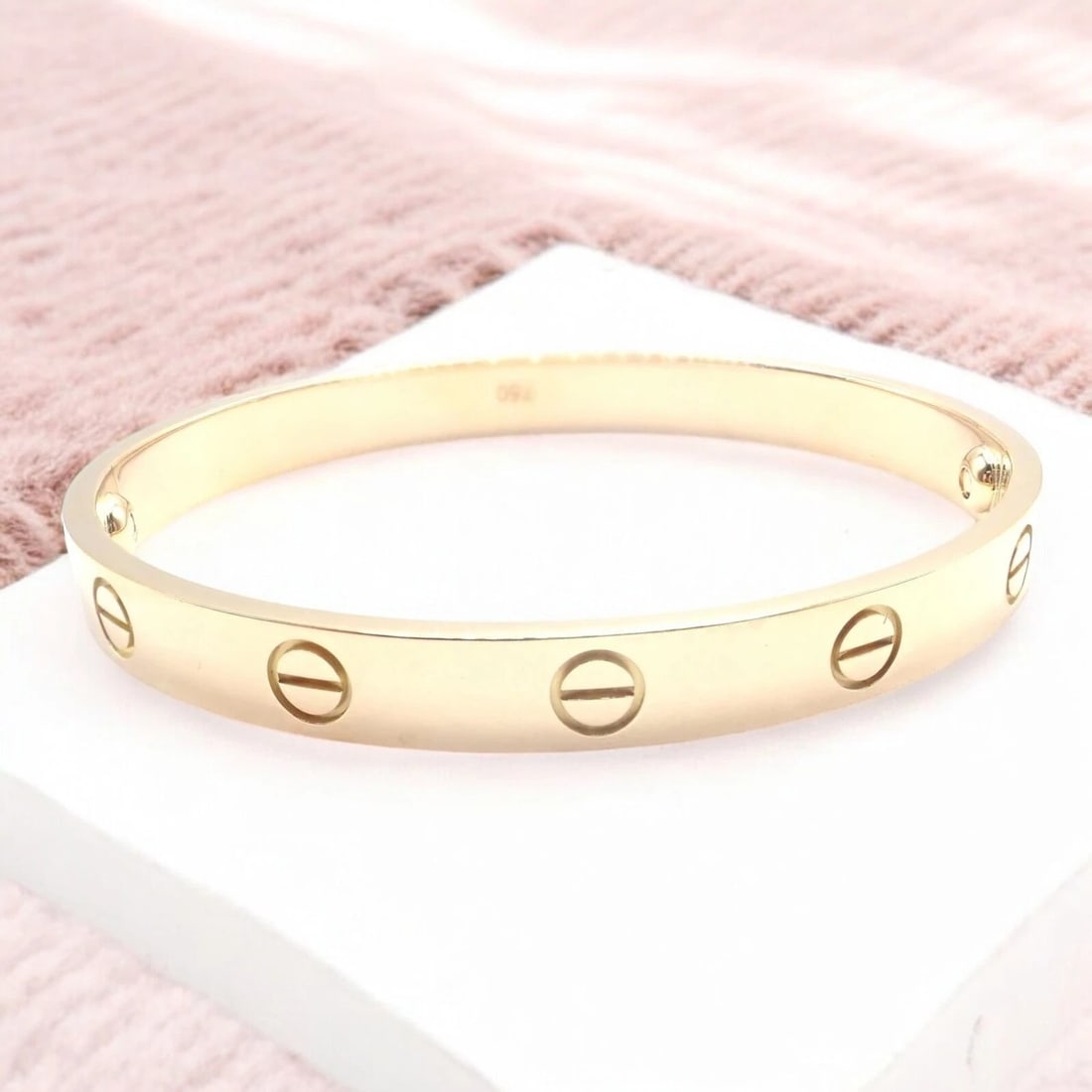 Authentic! Cartier 18k Yellow Gold Love Bangle Bracelet Size 19 Paper: Authentic! Cartier 18k Yellow Gold Love Bangle Bracelet Size 19 Paper About This Piece: The authentic Cartier 18k Yellow Gold Love Bangle, Size 19, is a classic emblem of timeless romance. Featuring C