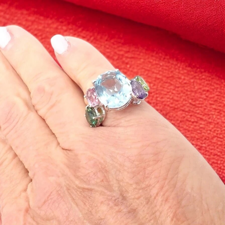 Authentic! Asprey Chaos 18k White Gold Topaz Tourmaline Peridot Amethyst Ring: Authentic! Asprey Chaos 18k White Gold Topaz Tourmaline Peridot Amethyst Ring About This Piece: The Asprey Chaos Ring, crafted in 18k white gold, features a bold, asymmetrical design with blue topaz,