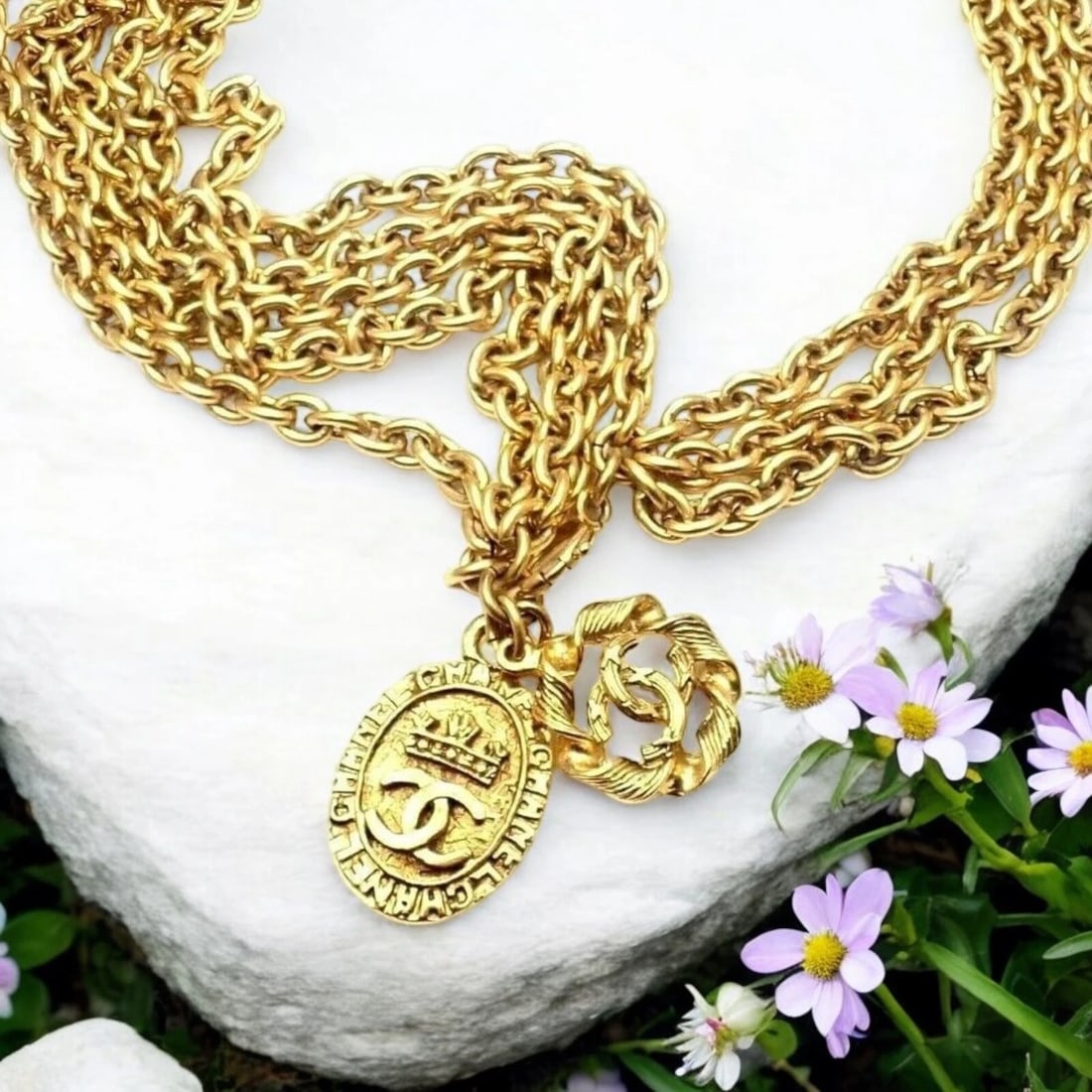 Amazing Authentic Chanel Gold Tone 3 Row Draped Clasp Belt Necklace 34": Amazing Authentic Chanel Gold Tone 3 Row Draped Clasp Belt Necklace 34" About This Piece: Elevate your style with this rare, authentic Chanel 3 Row Draped Clasp Belt Necklace in glistening gold tone.