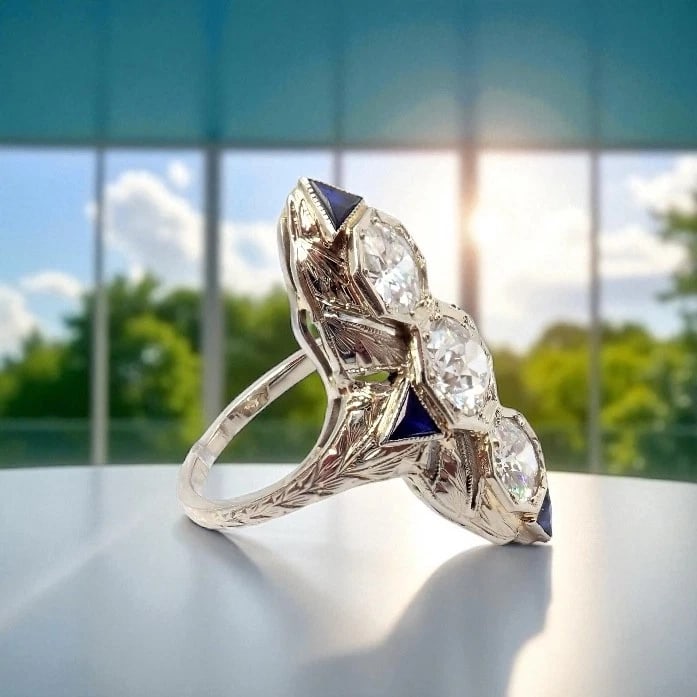 Vintage Estate 20k White Gold Diamond 2ctw Sapphire Art Deco Ring sz 7: Vintage Estate 20k White Gold Diamond 2ctw Sapphire Art Deco Ring sz 7 About This Piece: This vintage estate Art Deco ring features intricate 20k white gold filigree, set with three old miner cut diam