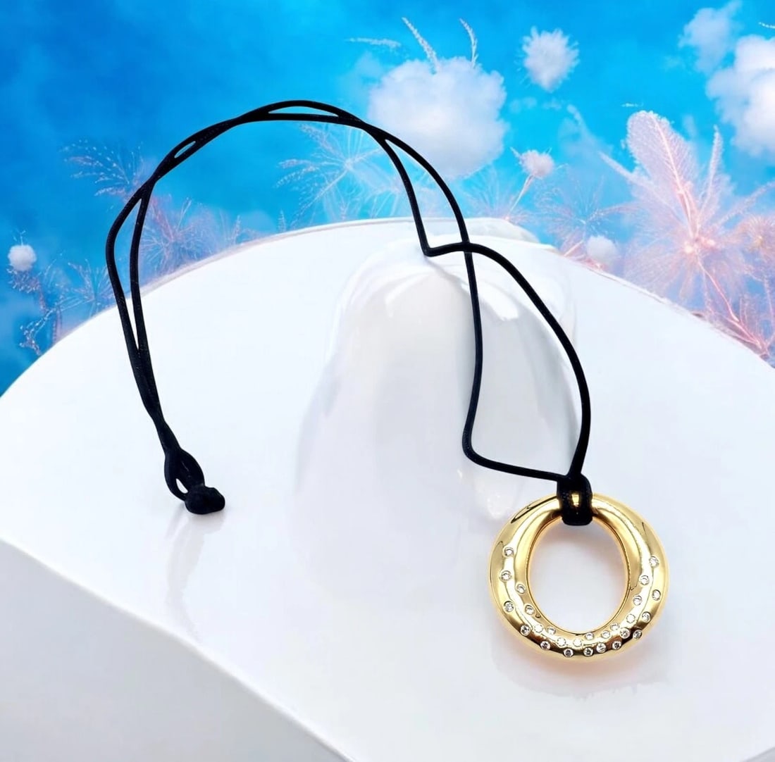 Authentic! Tiffany & Co 18k Yellow Gold Peretti 25mm Diamond Sevillana Necklace: Authentic! Tiffany & Co 18k Yellow Gold Peretti 25mm Diamond Sevillana Necklace About This Piece: This Tiffany & Co. necklace features an 18k yellow gold Sevillana pendant, designed by Elsa Peretti. M