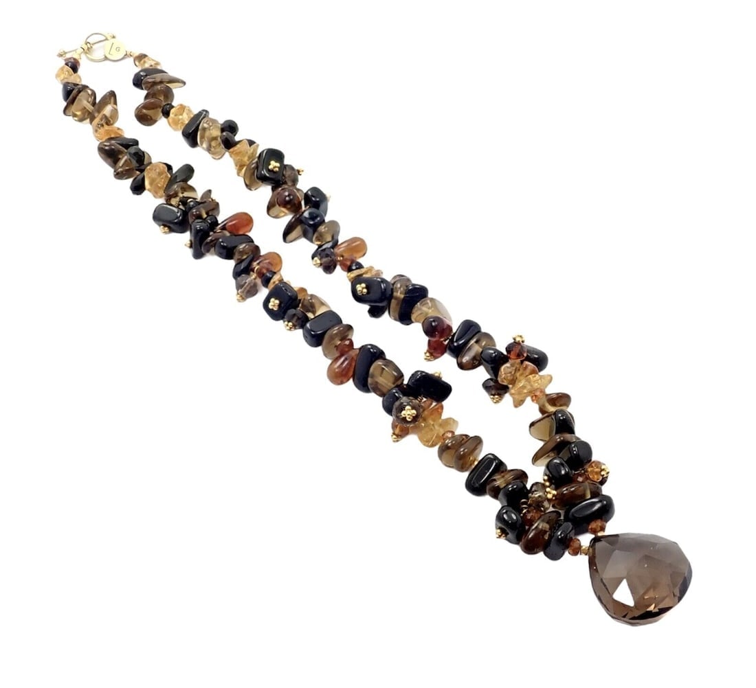 Laura Gibson 18k Yellow Gold Briolette Smokey Topaz Onyx Bead Large Necklace: Laura Gibson 18k Yellow Gold Briolette Smokey Topaz Onyx Bead Large Necklace Laura Gibson 18k Yellow Gold Briolette Smokey Topaz Onyx Bead Large Necklace Product Description About This Piece: Metal: 1
