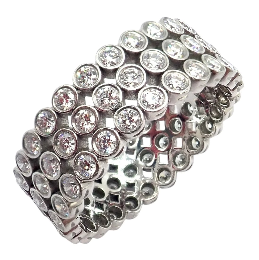 Authentic! Tiffany & Co Platinum Diamond Three Row Jazz Band Ring Size 6: This authentic Tiffany & Co. Jazz band ring features three rows of brilliant bezel-set diamonds in luxurious platinum. Modern, fluid, and endlessly sparkling, it showcases Tiffany’s refined craf