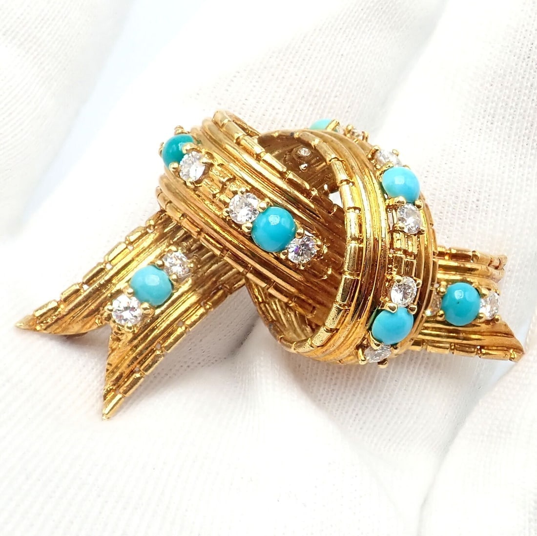 Vintage Tiffany & Co. 18k Yellow Gold Diamond Turquoise Bamboo Bow Pin Brooch: Vintage Tiffany & Co. 18k Yellow Gold Diamond Turquoise Bamboo Bow Pin Brooch Vintage Tiffany & Co. 18k Yellow Gold Diamond Turquoise Bamboo Bow Pin Brooch Product Description About This Piece: The Vi