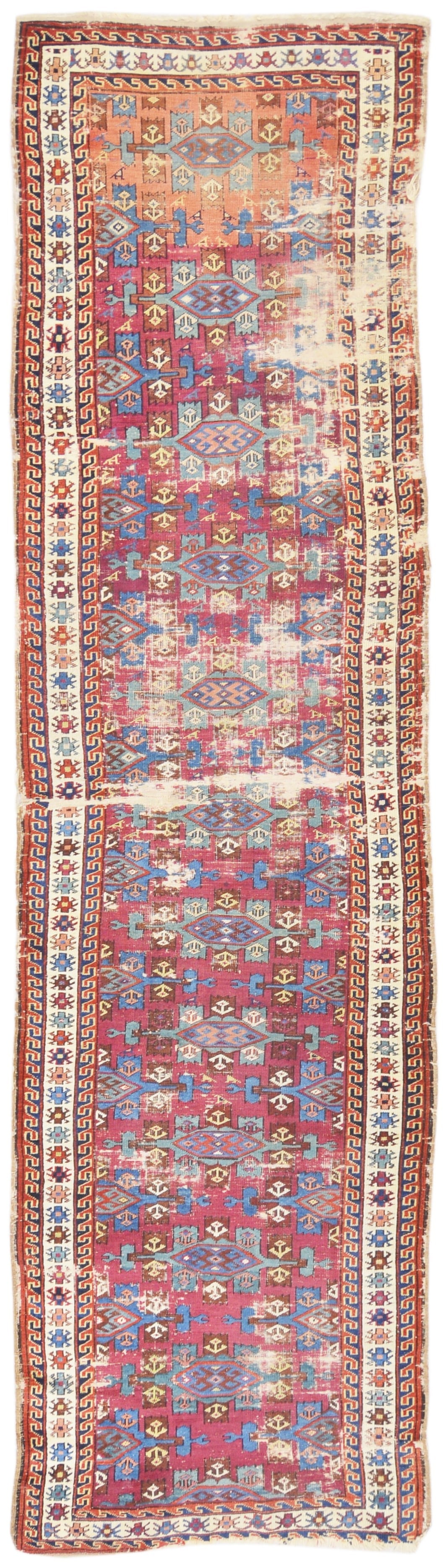 HAND KNOTTED WOOL ANTIQUES RUG: Title:HAND KNOTTED WOOL ANTIQUES RUGDimensions:3X12'4Age:ANTIQUEOrigin:RUSSIA Reserve: $2,500.00 Shipping:Domestic: Shipping rates are determined by destinationInternational: Foreign shipping rates
