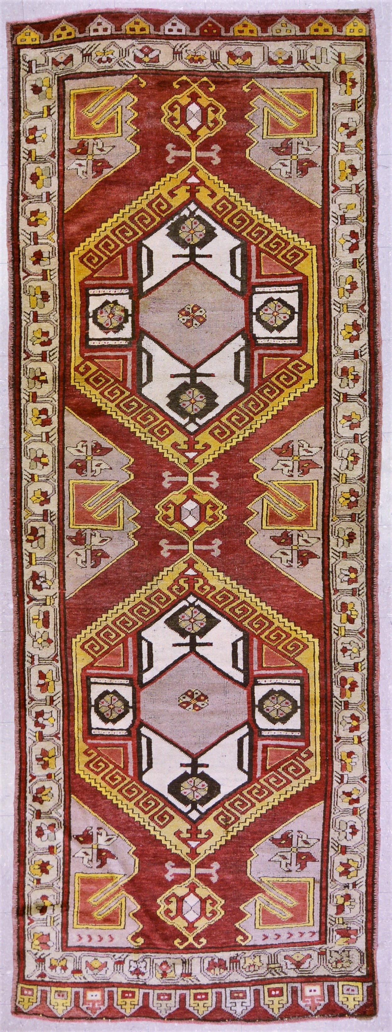 HAND KNOTTED WOOL OUSHAK RUG: Title:HAND KNOTTED WOOL OUSHAK RUG Dimensions:4X10'9 Age:VINTAGE Origin:TURKISH Reserve: $2,500.00 Shipping: Domestic: Shipping rates are determined by destination International: Foreign sh