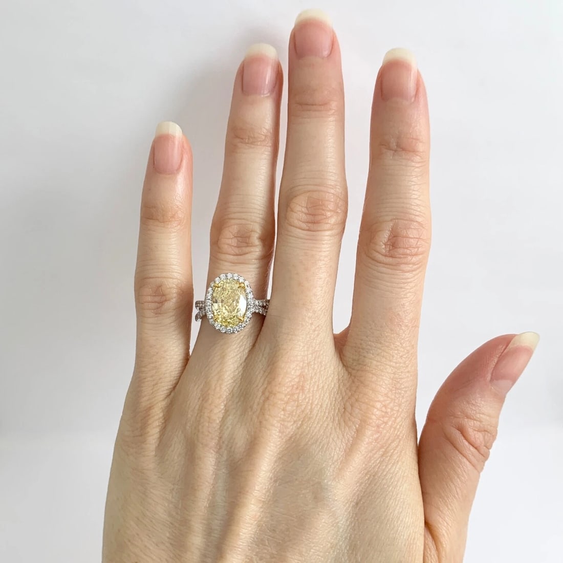 GIA Fancy Yellow Oval Diamond Halo Engagement Ring Platinum, 3.97 CTW - 3