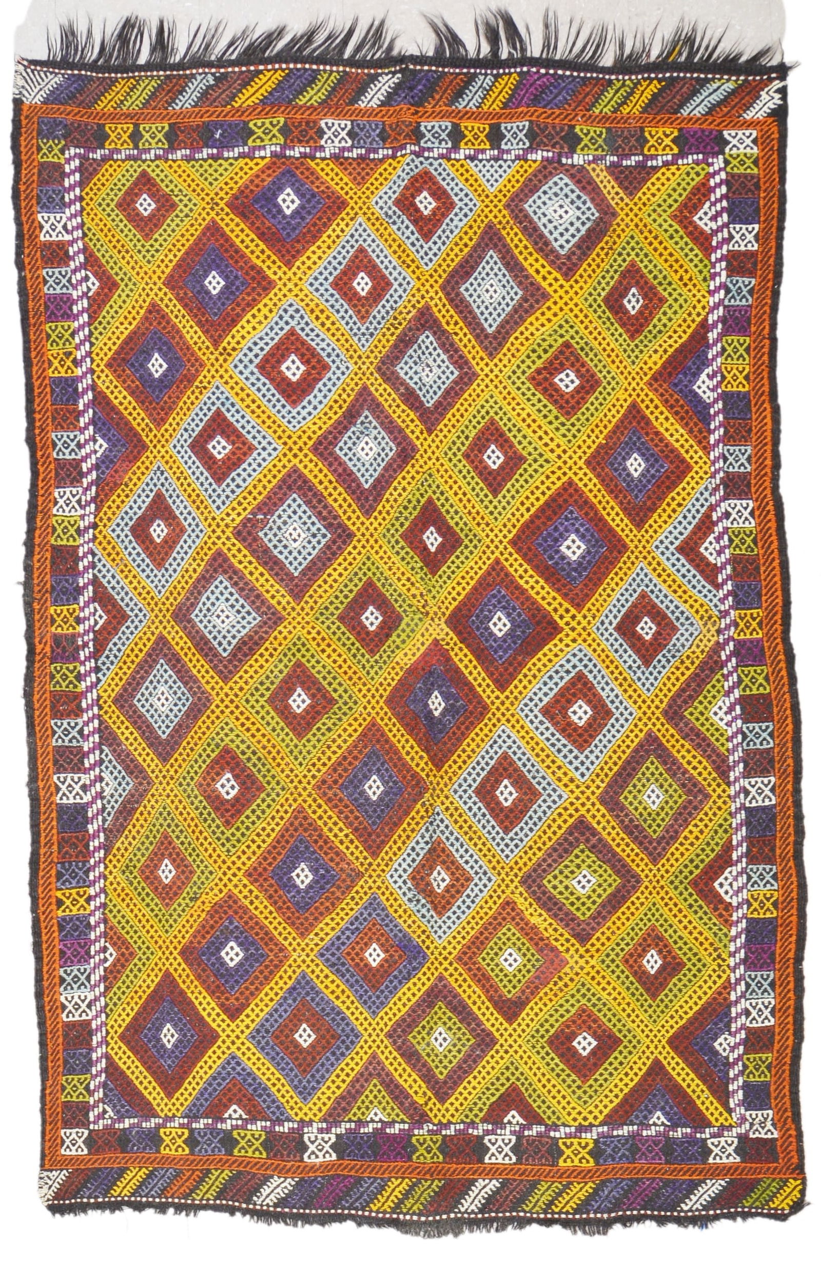FLATWEAVE WOOL KILIMS RUG: Title:FLATWEAVE WOOL KILIMS RUGDimensions:5'3X8Age:VINTAGEOrigin:TURKISH Reserve: $1,375.00 Shipping:Domestic: Shipping rates are determined by destinationInternational: Foreign