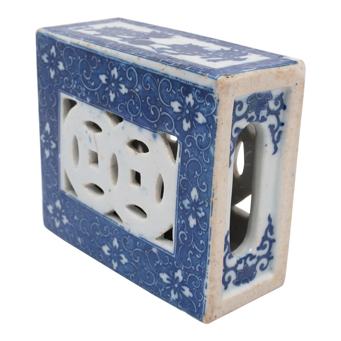 Chinese Blue and White Fu Lion Headrest, C. 1920: This square ceramic block is actually a form of Chinese headrest or neck pillow. Popular during the Qing dynasty, rigid headrests such as this were used by upper-class women to protect their