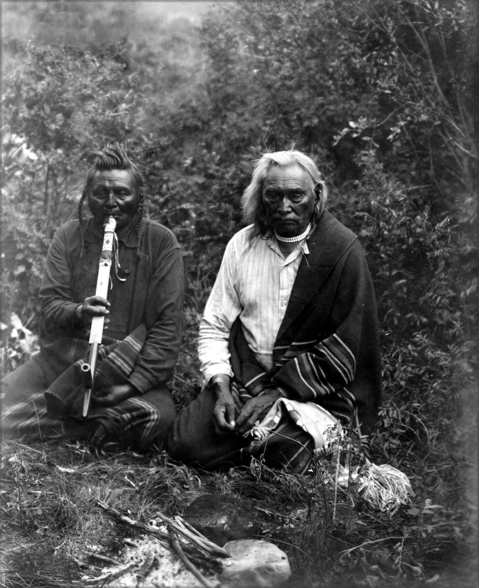 A SMOKE: Title: A SMOKE Artist/Source: EDWARD SHERIFF CURTIS Original Date: 1905 Dimensions: 8X10 Description: || UNITED STATES SHIPPING ONLY! || This lot is a Dye Based Photolithograph and is a restoration pr