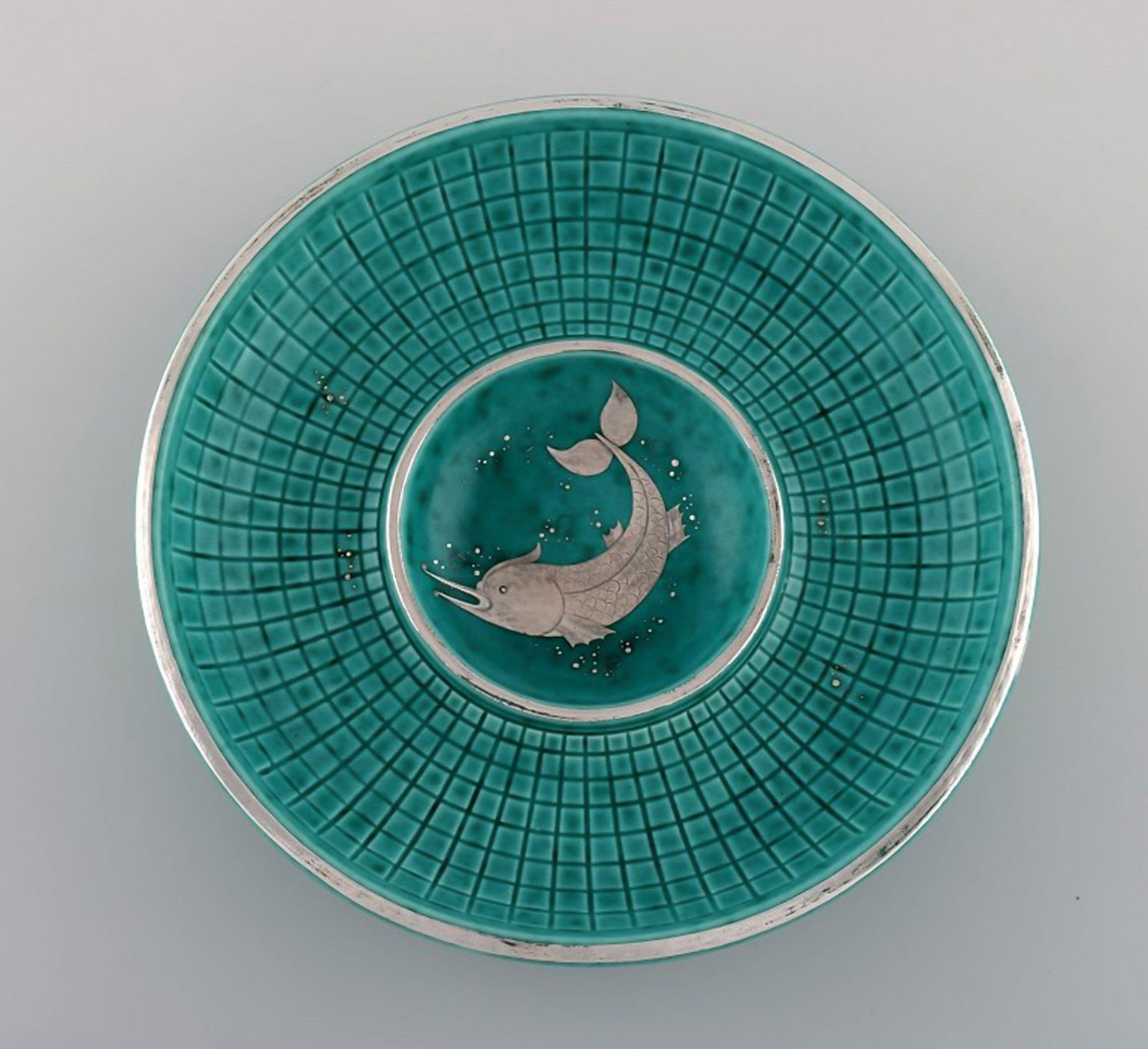 Wilhelm Kåge for Gustavsberg. Rare Argenta art deco bowl in glazed ceramics decorated with fish: Title: Wilhelm Kåge for Gustavsberg. Rare Argenta art deco bowl in glazed ceramics decorated with fish in silver inlay. Sweden 1940's. Description: Wilhelm Kåge for Gustavsberg. Rare Argenta