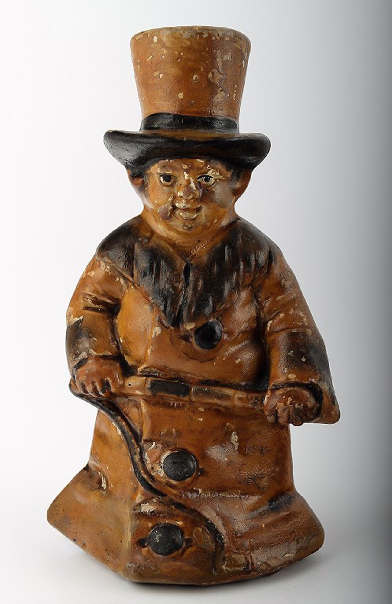 English figure in stoneware after Charles Dickens "Oliver Twist". (1 of 4)