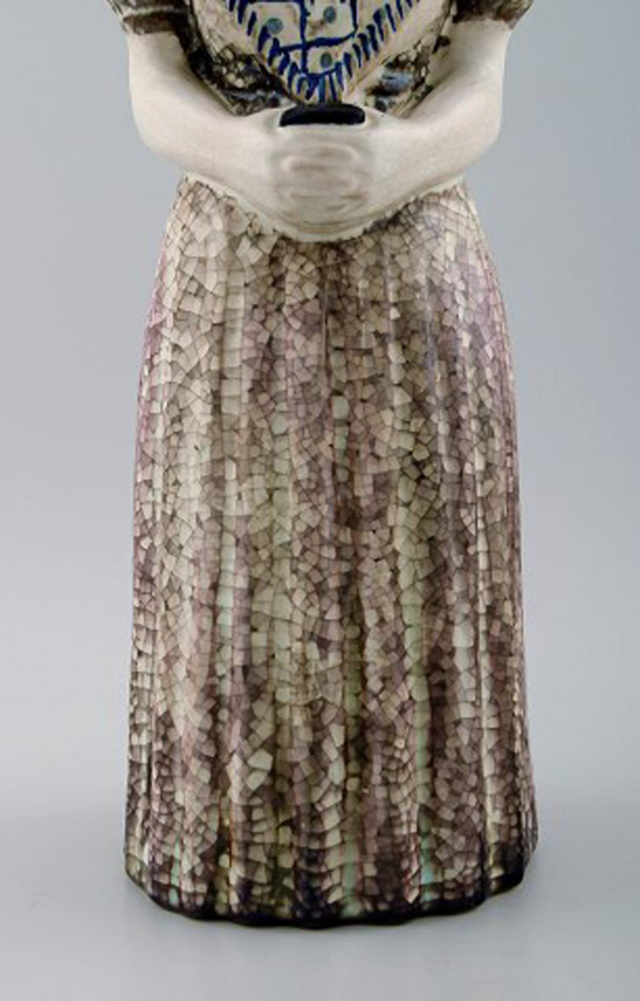 Michael Andersen Ceramics from Bornholm. Large figure of woman with Songbook in national dress. No. - 6