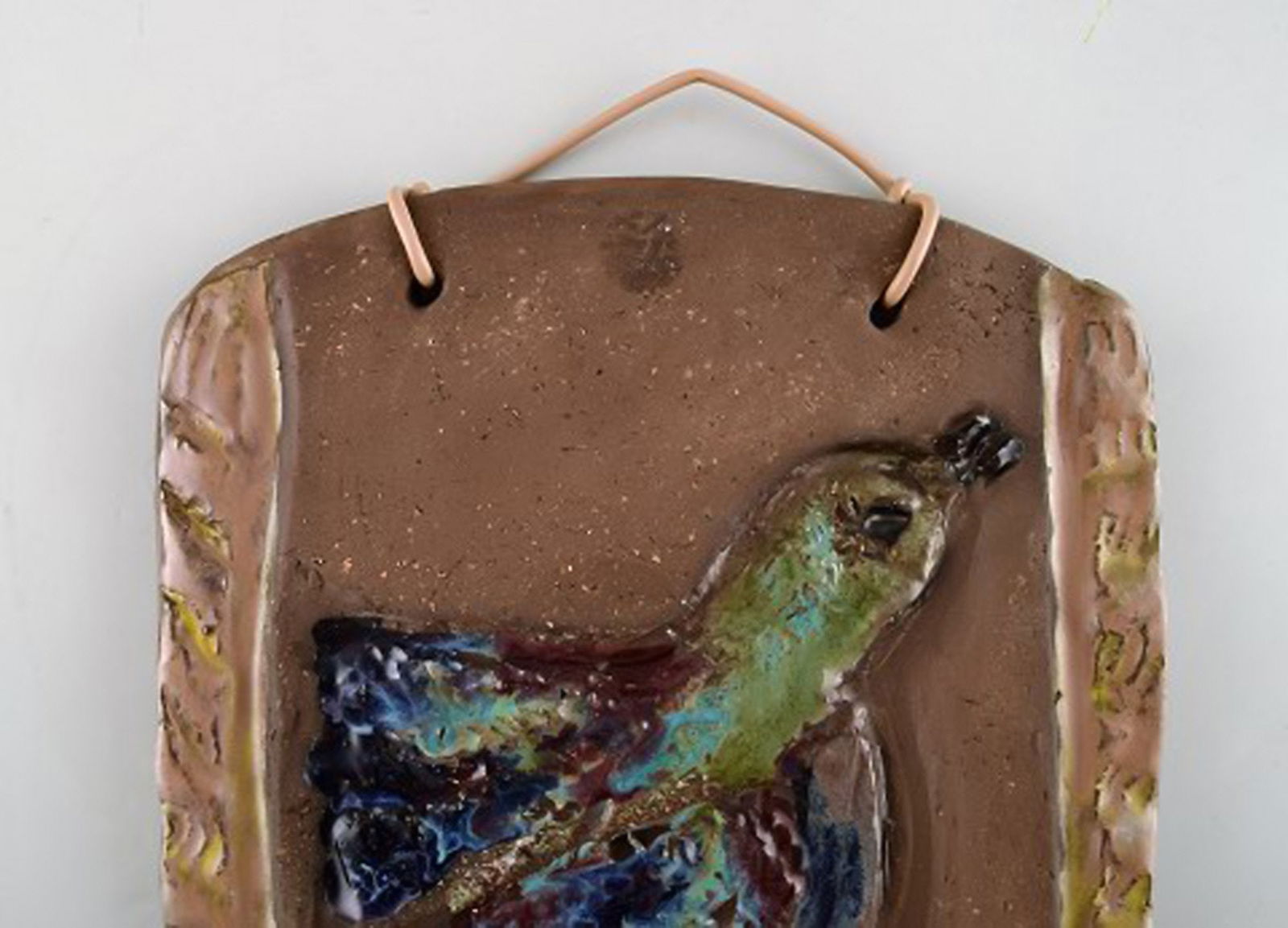 Swedish ceramist. Glazed ceramic wall plaque with bird motif. 1960's. - 2