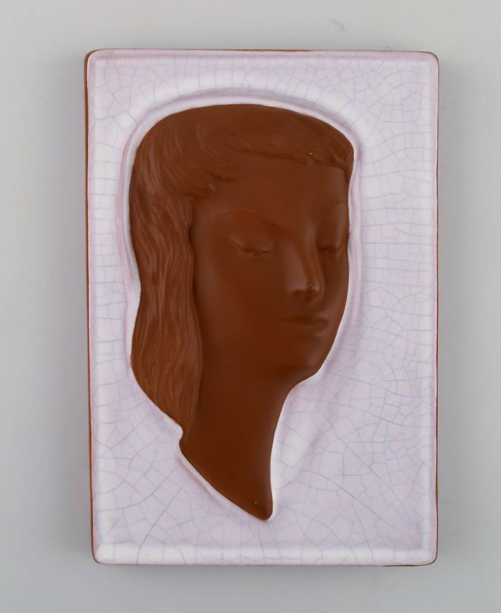 Goldscheider art deco relief in glazed ceramics with woman's face. Austria, 1950's. (1 of 5)
