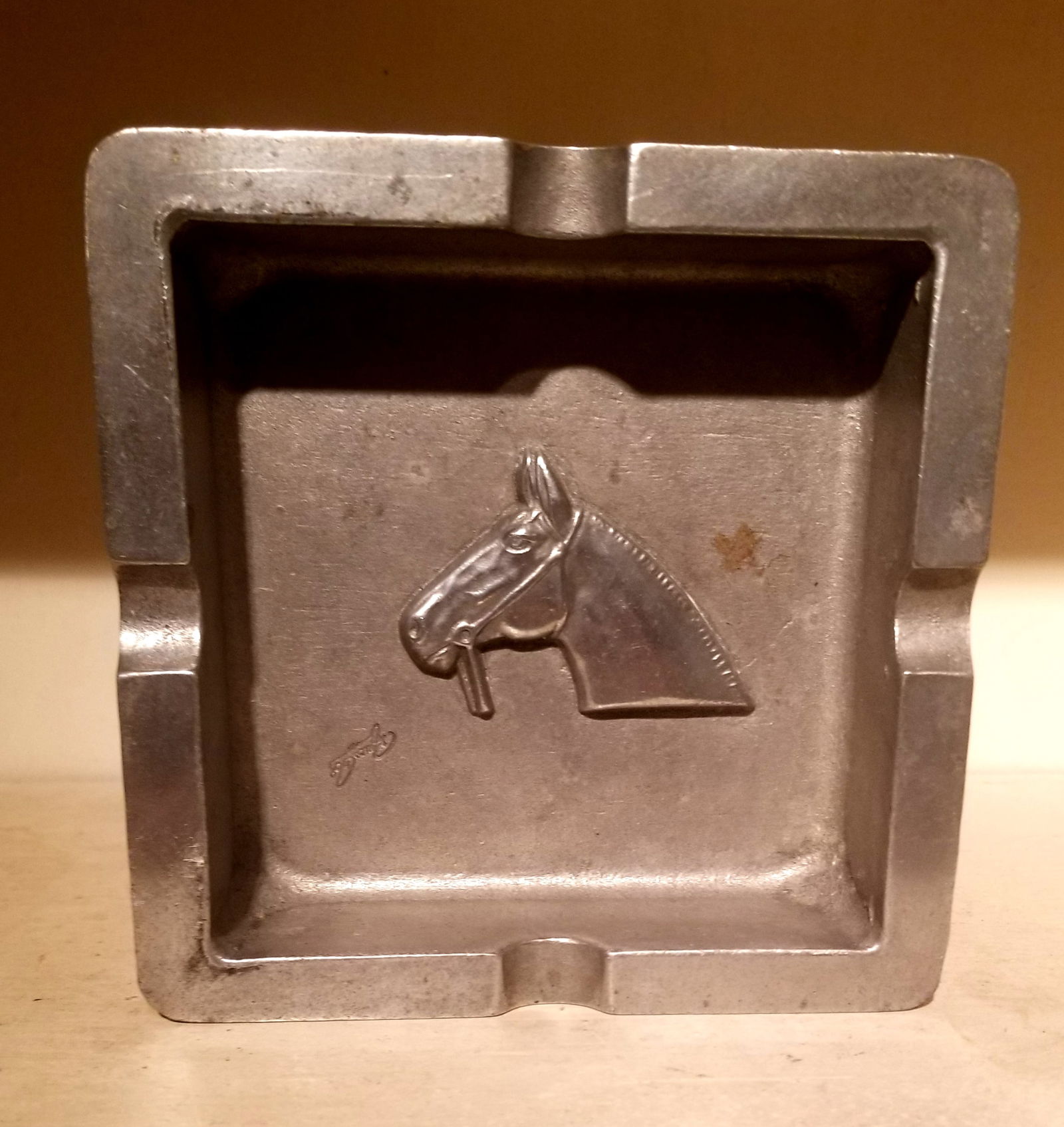 Heavy metal...aluminum?...ashtray with a horse's head (1 of 2)