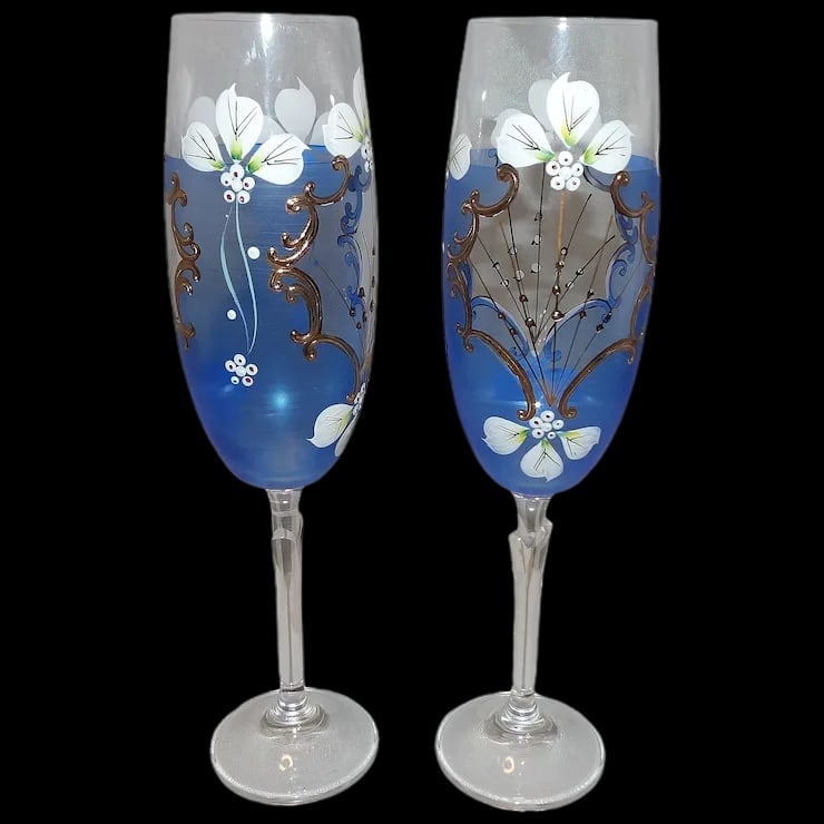 Bohemian Hand Painted Champagne Flutes with 22Kt Gold Accents: This pair of Bohemian Hand Painted Champagne Flutes with 22Kt Gold Accents is in Excellent condition. No missing paint, or stains and have a beautiful stem. This would make an excellent pair for a wed