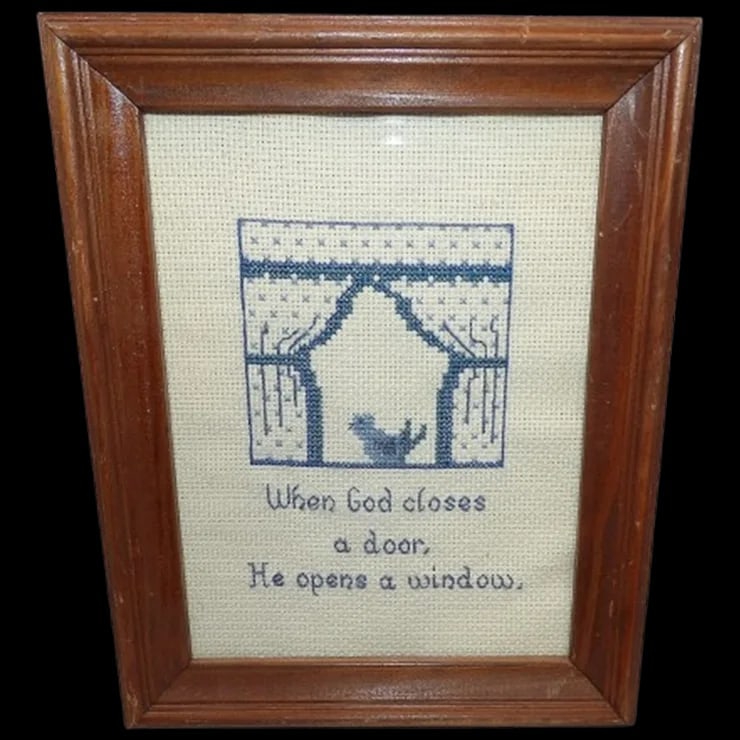 Framed Cross-stitch-When God closes a door, He opens a window: This framed When God closes a door, He opens a window is in excellent condition. It measures 9 ½” x 7 ½”. It is dated on the back 1985. Item id: ls009624 Room: bedroom, living ro