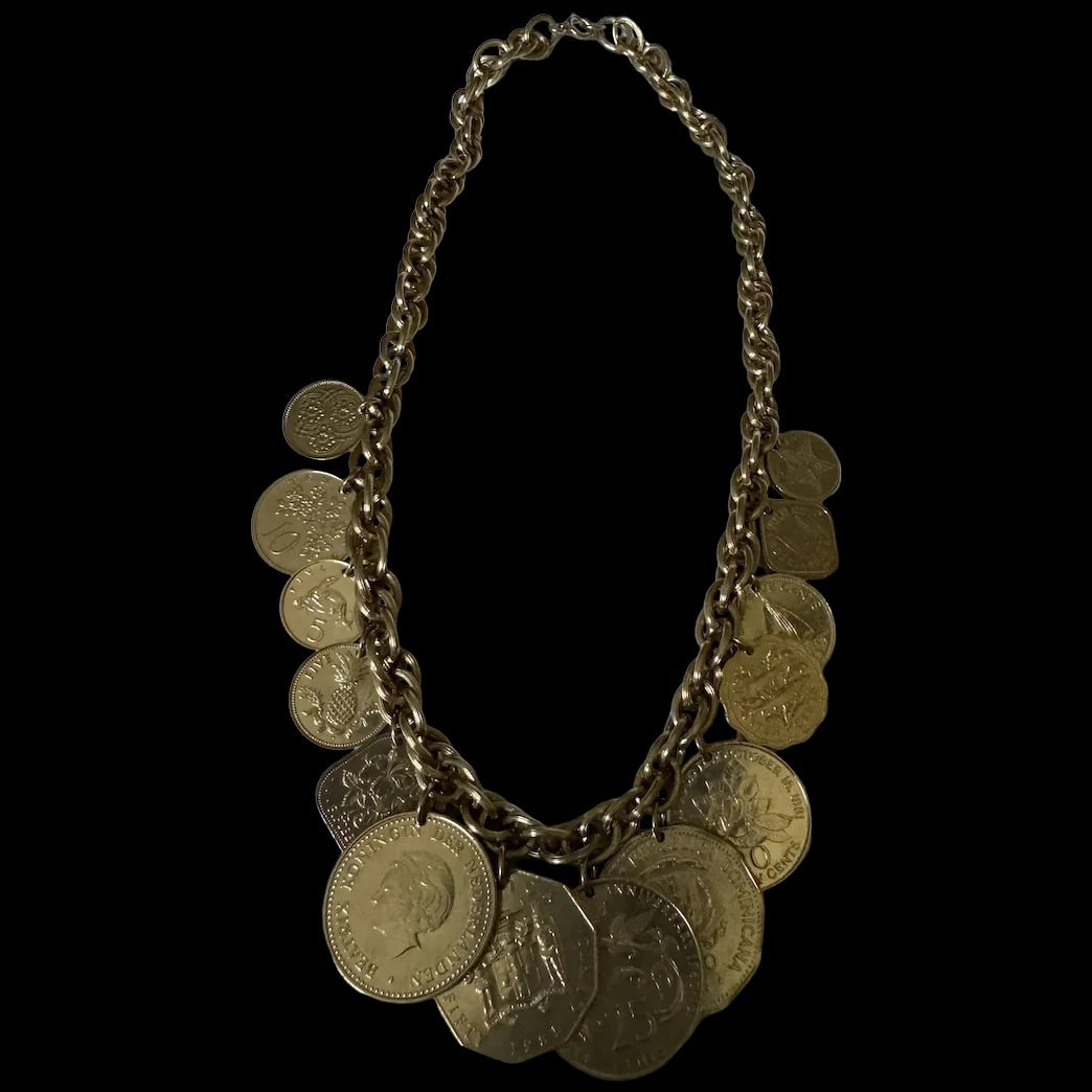 Vintage Franklin Mint Heavy Chain Caribbean Coin Necklace 24K Gold Plated: This vintage necklace from Franklin Mint features a heavy chain with Caribbean coin charms plated in 24K gold. The coins are attached to a chain with large links that is 18 inches long. The necklace h