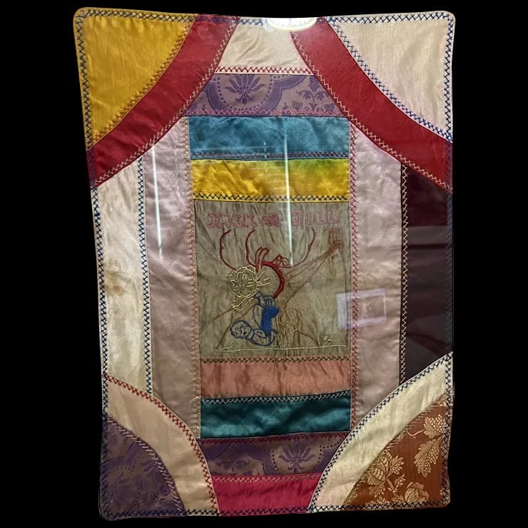 Antique Victorian CRAZY QUILT Nursery Rhyme Framed: Very old pc of victorian crazy quilt put in frame with Jack and Jill nursery rhyme in center.Measures 22x17" including frame.frame is a ornate thin gold wood frame, very unusual quilt must have meanin