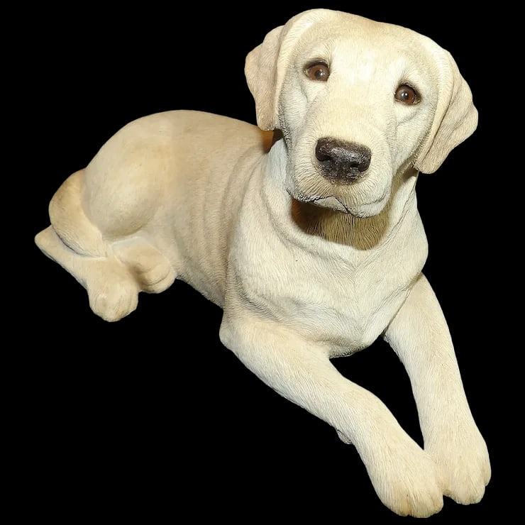 Yellow Labrador Sculpture Signed by Sandra Brue: This charming Yellow Labrador is a hand casted and hand painted sculpture by Sandra Brue who started the company SANDICAST in 1981. This piece was created in 1991. It measures approximately 11”