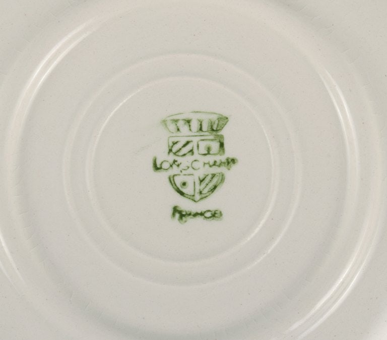 Longchamp, France, hand painted, ten small faience plates. - 5